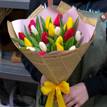 19 tulips in kraft paper